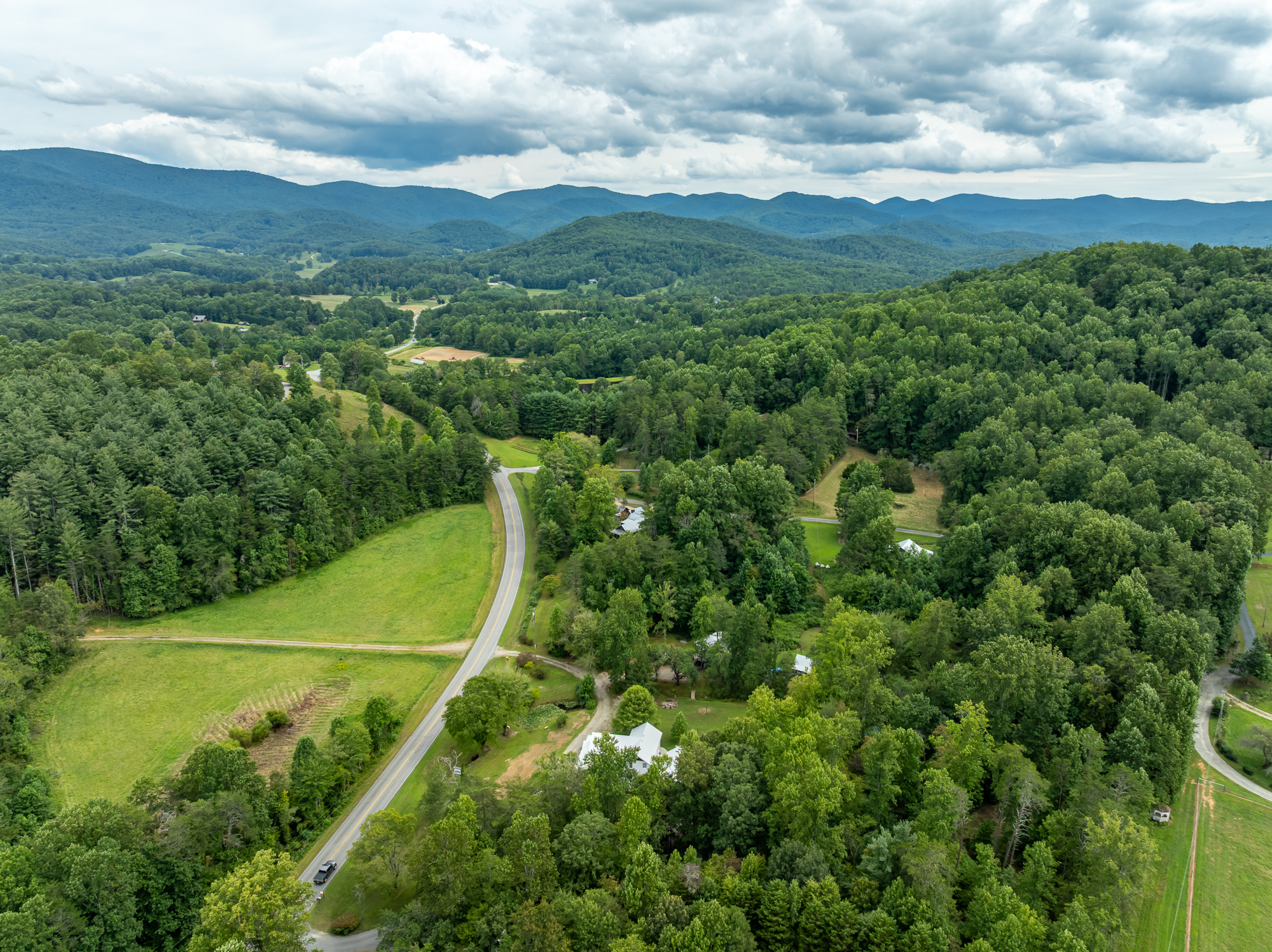 An aerial view of a winding mountain road near Blairsville, GA, part of the Georgia Gauntlet motorcycle route