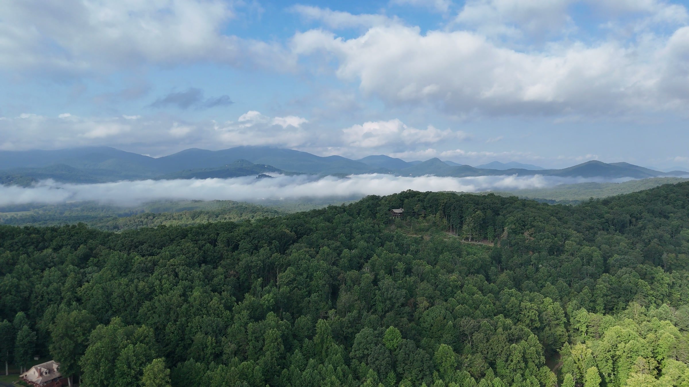 Cloud settled in the valleys of the layered Blue Ridge mountains around Blairsville, Georgia