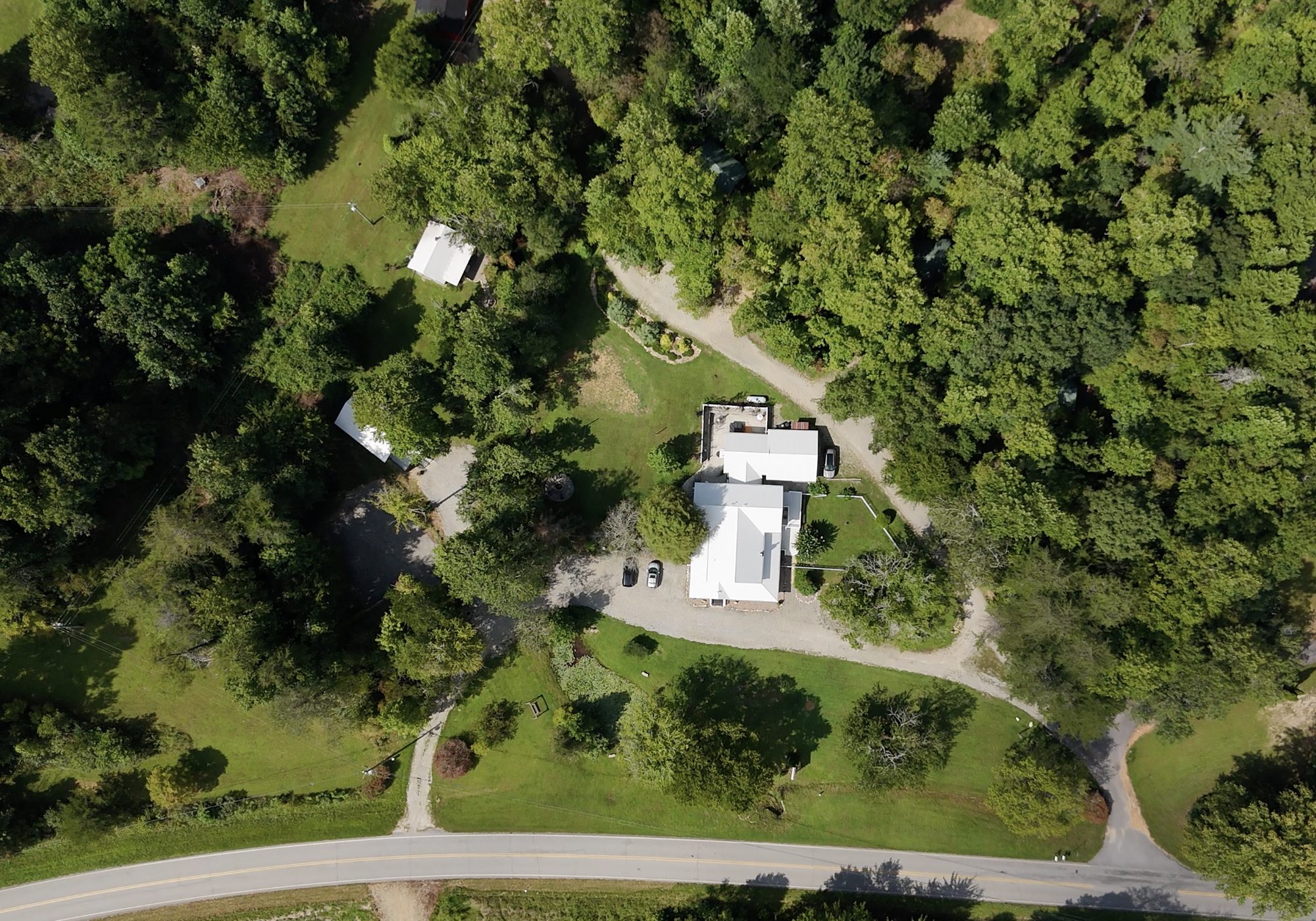 Aerial view of the Misty Mountain property showing the lodge and surrounding cabins