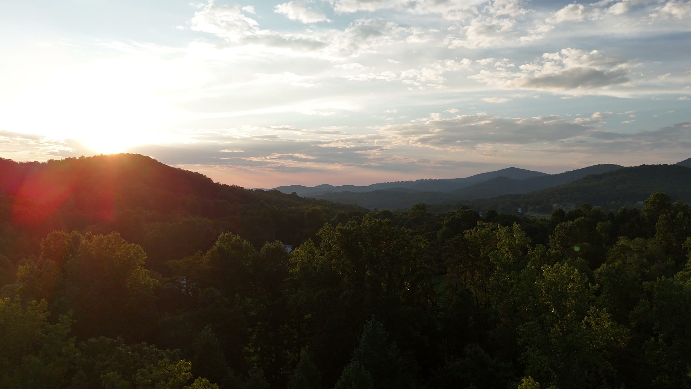 Sun breaking over the Blue Ridge mountains near Blairsville, Georgia