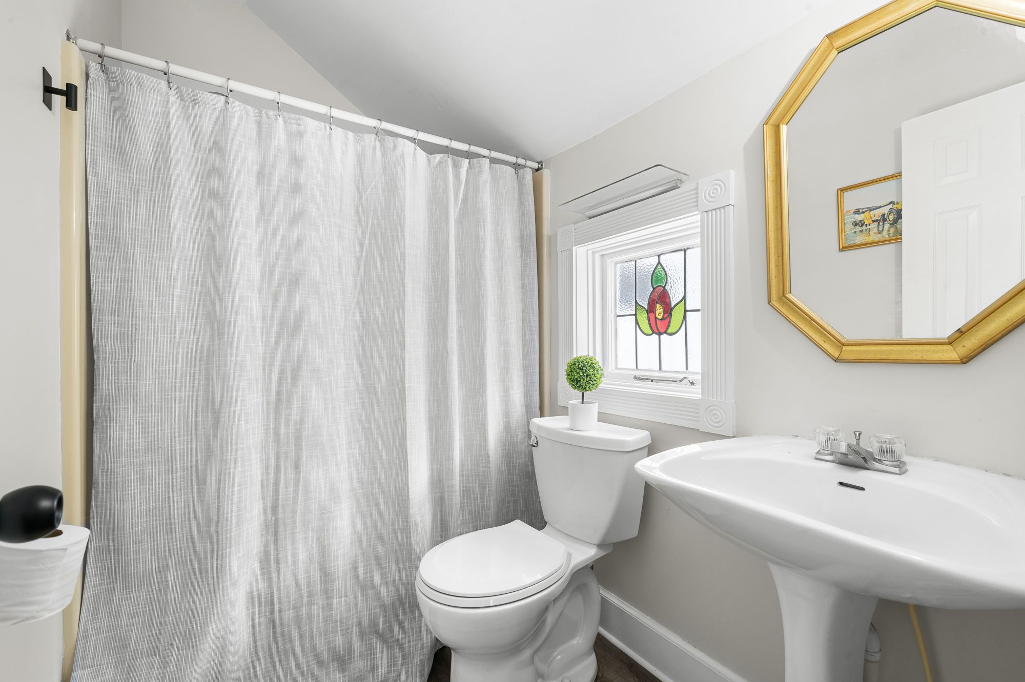 The Seafarer bathroom with a tub and shower combination