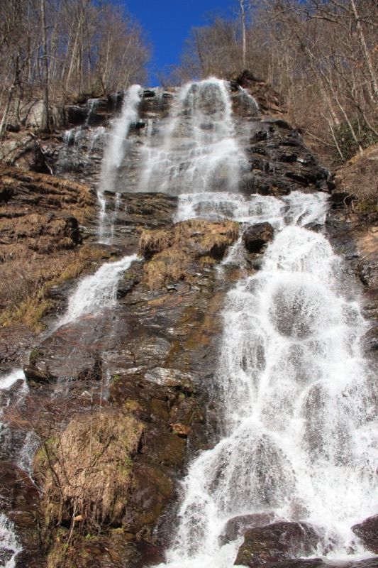 A tall waterfall cascading over rock in the North Georgia mountains